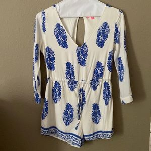 White and blue romper with beautiful designs